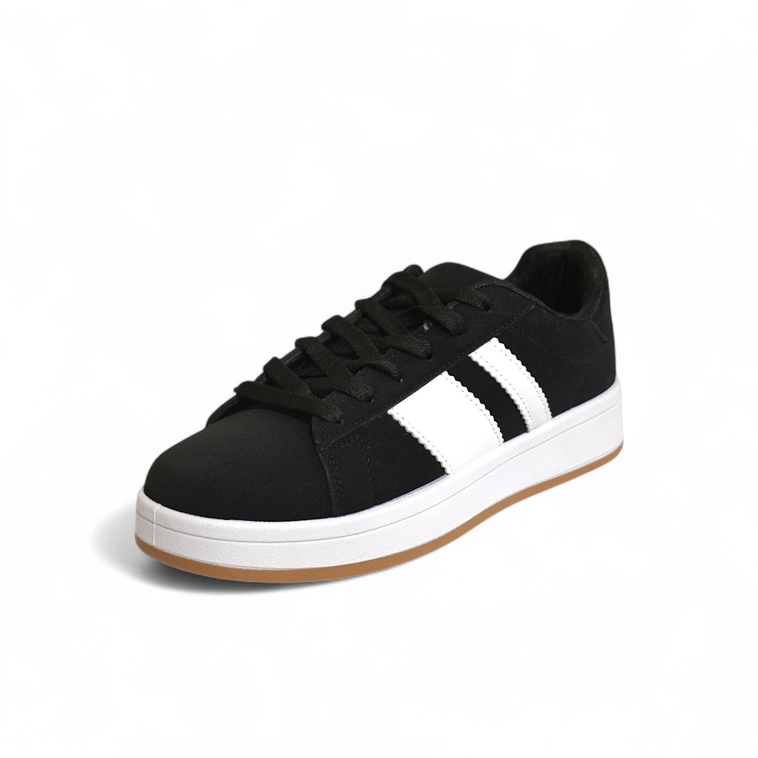 Zapatillas urbanas de mujer estilo skate en color negro con franjas blancas y suela plana de goma