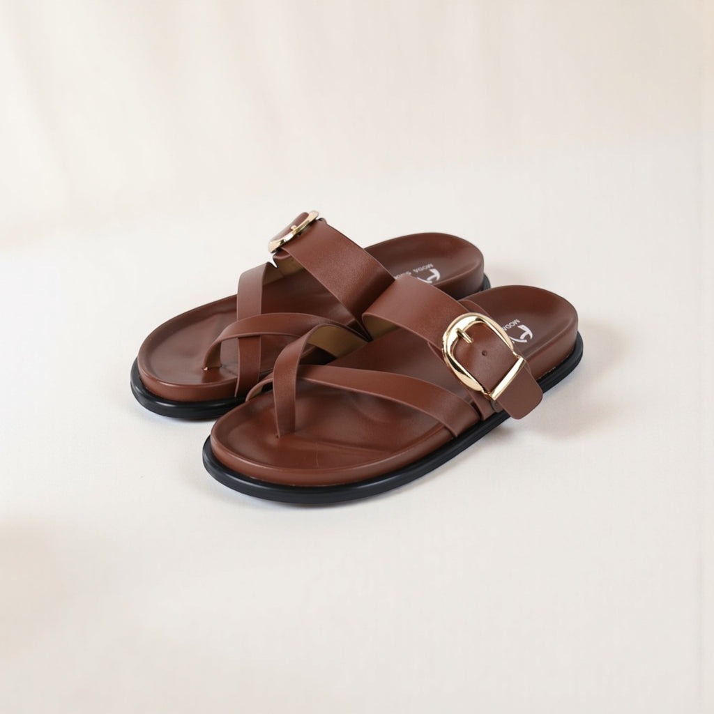 Sandalias planas tipo chancla para mujer con tira cruzada y hebilla dorada, sandalias casuales efecto cuero sintético con plantilla acolchada, sandalias verano cómodas en negro y marrón