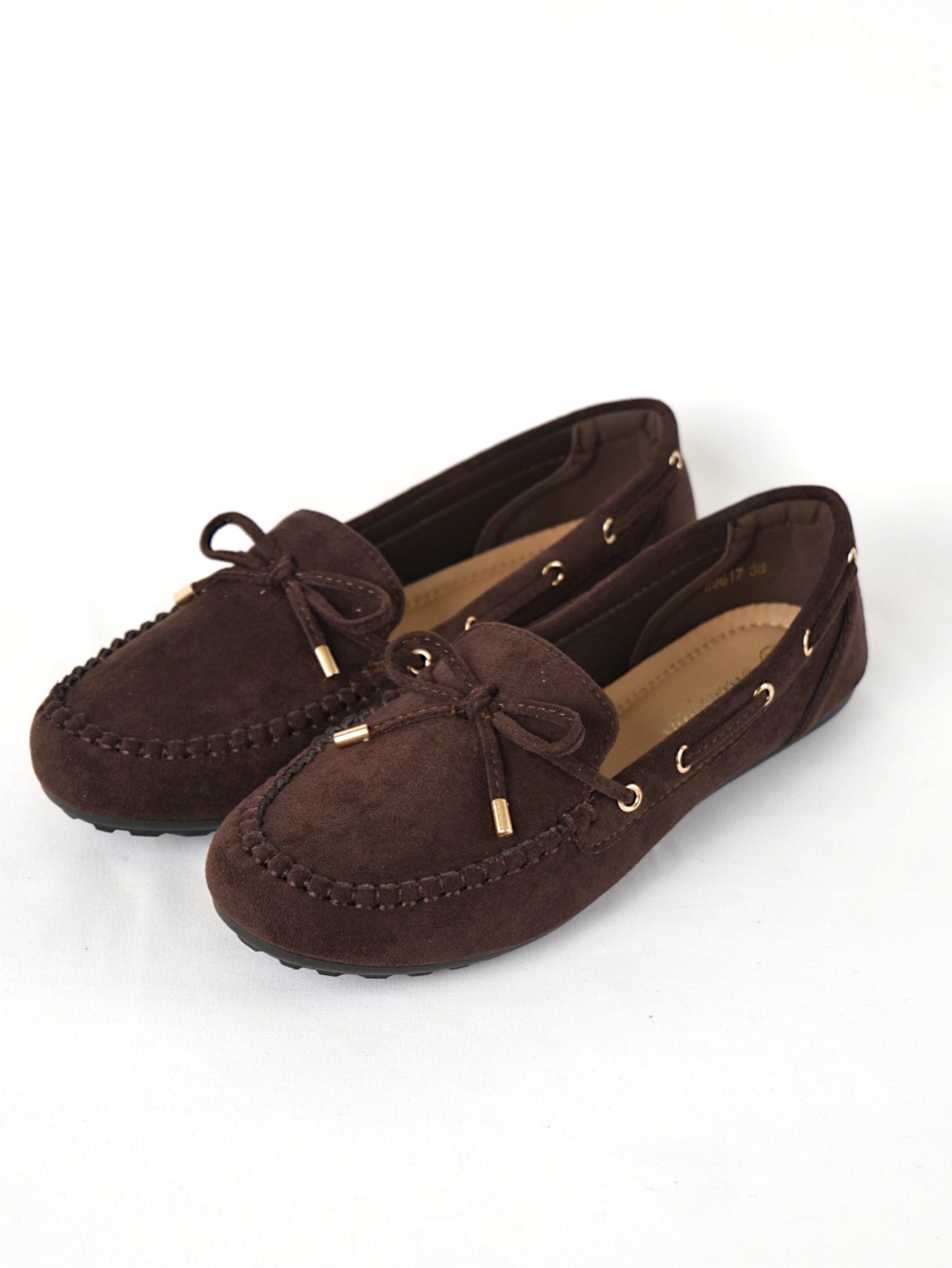 Mocasines planos para mujer con lazo decorativo y costuras tipo moccasin, zapatos casuales en efecto ante con detalle de cordón y ojales metálicos, mocasines cómodos para diario, oficina y looks casuales
