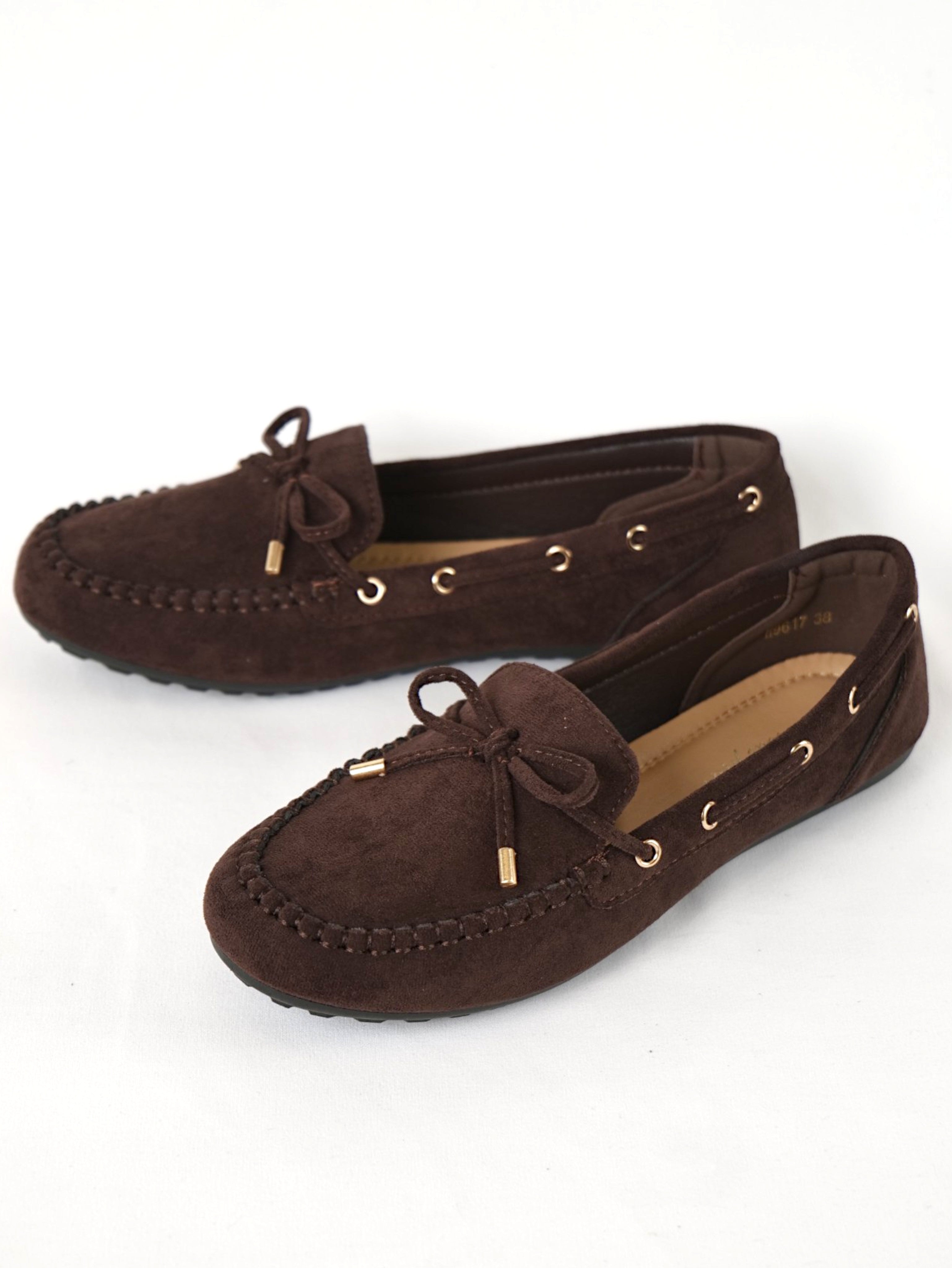 Mocasines planos para mujer con lazo decorativo y costuras tipo moccasin, zapatos casuales en efecto ante con detalle de cordón y ojales metálicos, mocasines cómodos para diario, oficina y looks casuales