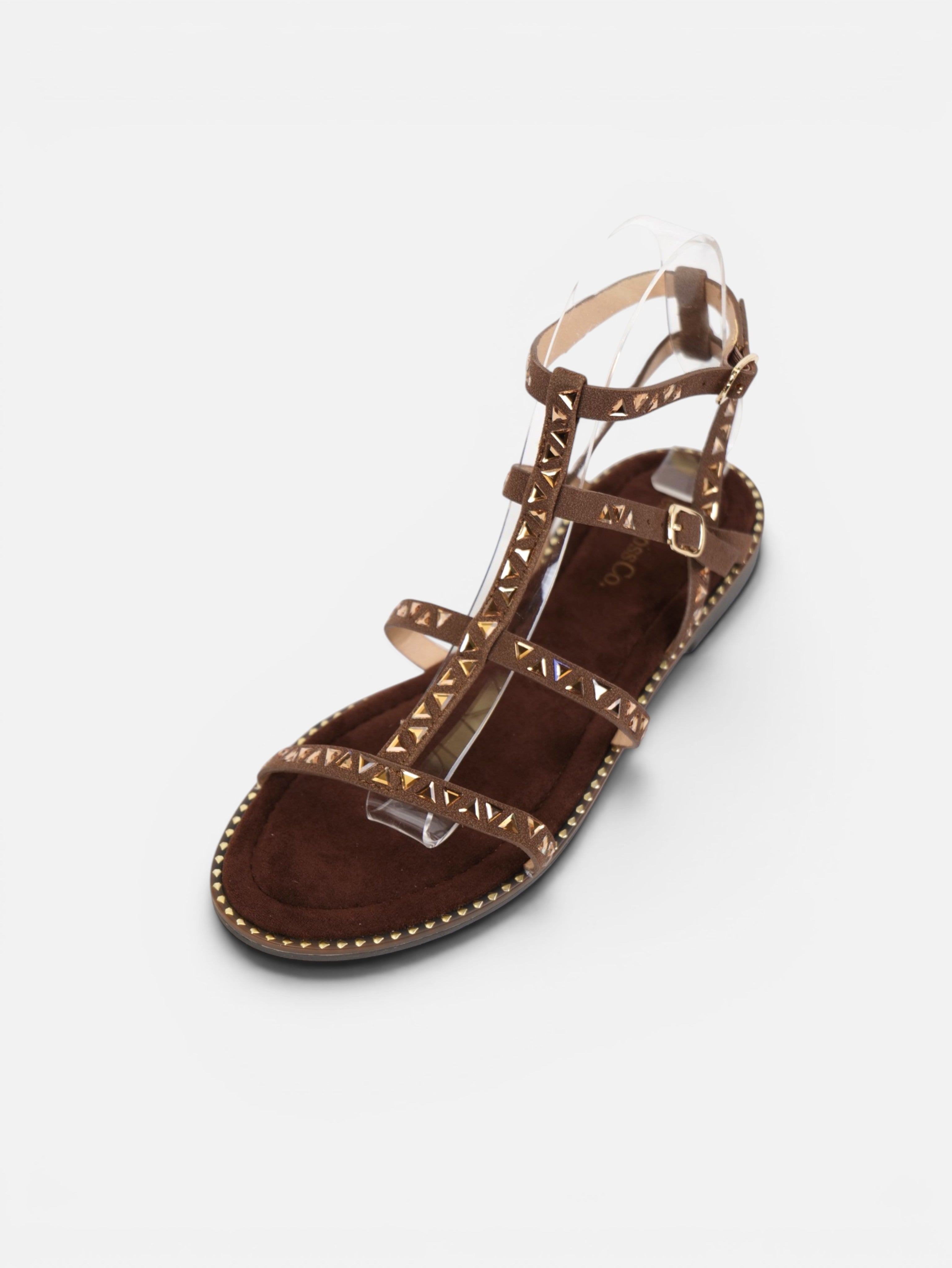 Sandalias romanas planas para mujer con tachuelas doradas, tiras finas y pulsera ajustable al tobillo