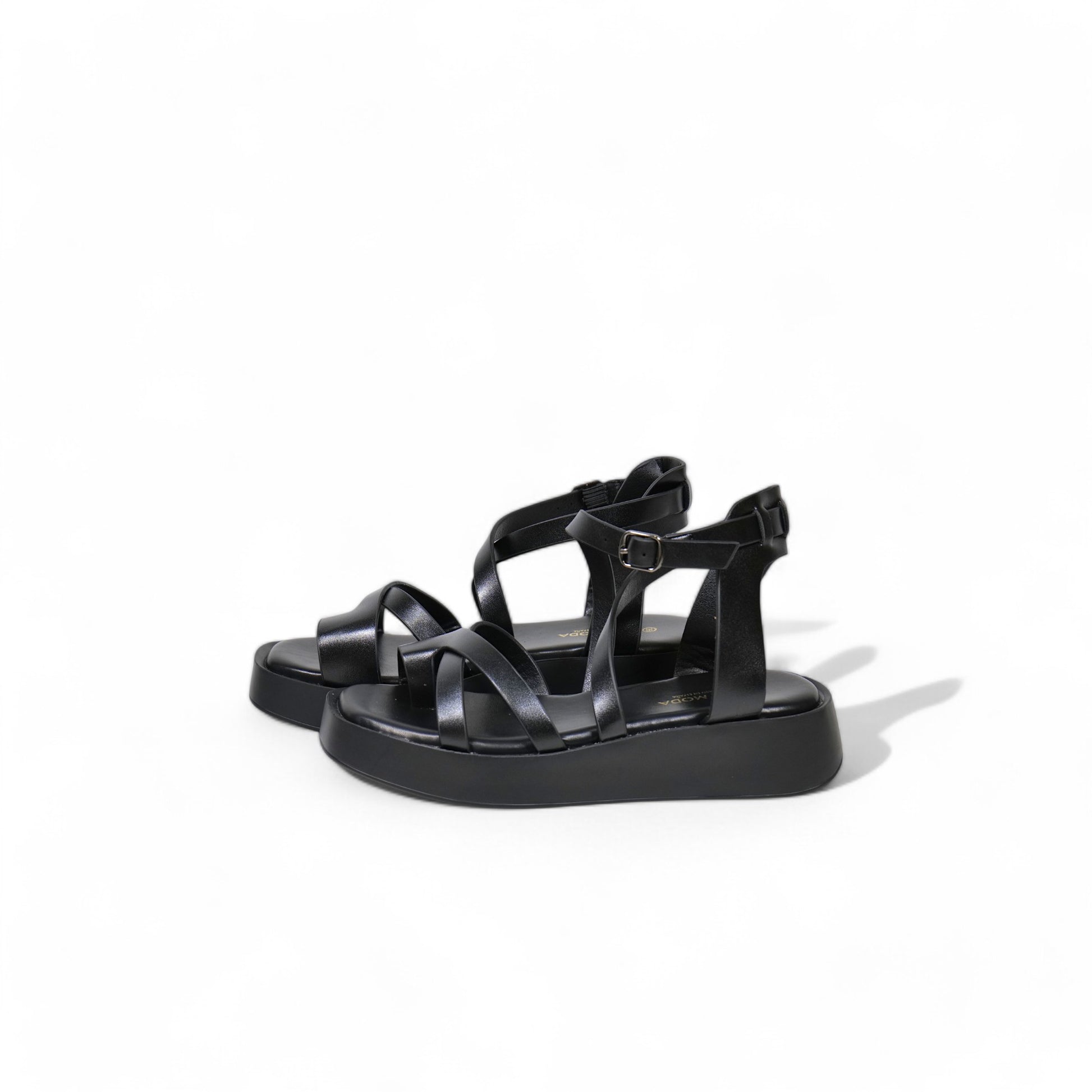 Sandalias planas con suela alta de tiras