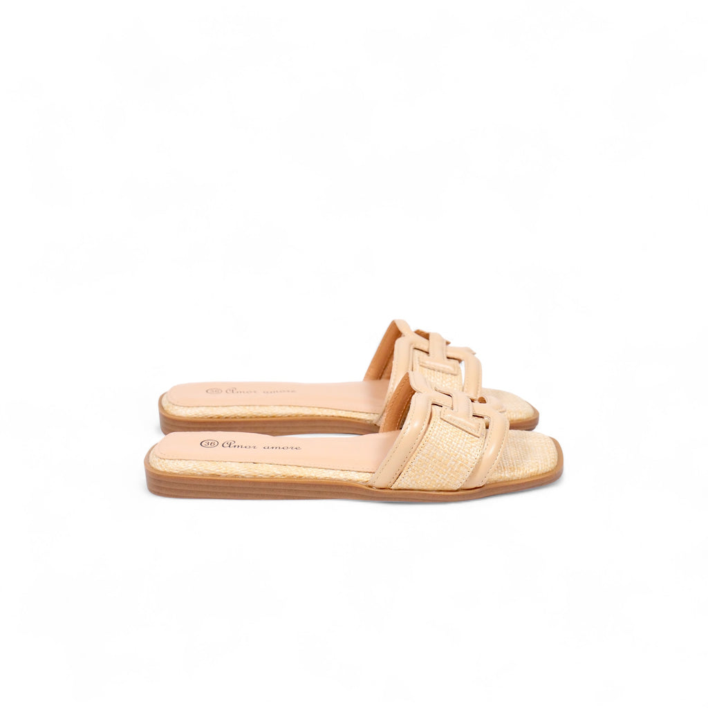 Sandalias planas diseño H calado