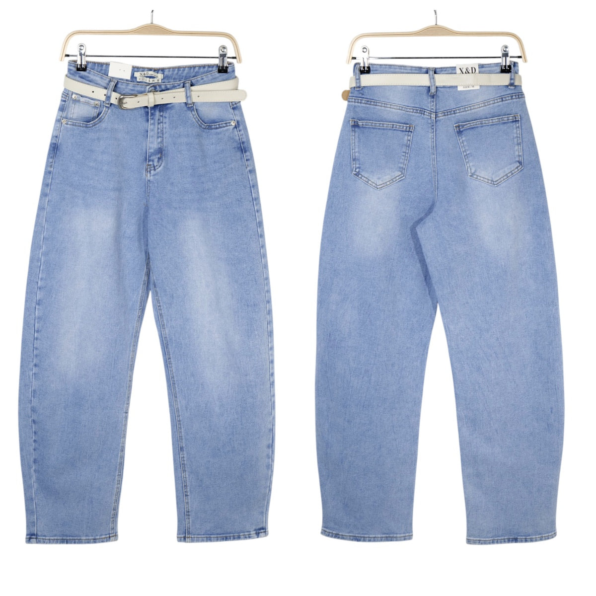 Jeans mujer tiro alto barrel leg denim azul claro con cinturón, pantalón vaquero corte curvado holgado moderno casual streetwear estilo minimalista outfit diario moda femenina